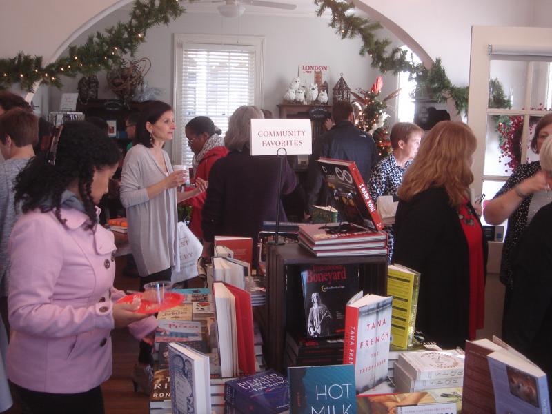 Customers peruse the shelves at Ernest & Hadley on opening day.