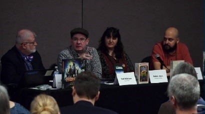 GAMA executive director John Stacy; booksellers Todd Dickinson and Andrea Jones; and indie board game seller Vincent Briseno