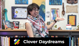 Clover, the founder of Clover Daydreams in Tacoma, Washington, stands in front of a bookcase.