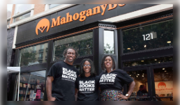 Mahogany Books owner Ramunda Lark-Young outside her store.