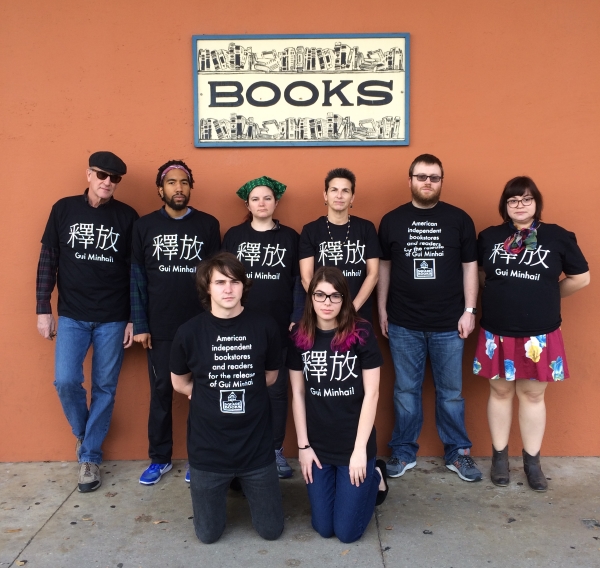 Square Books owner Richard Howrth and staff wearing Free Gui Minhai t-shirts.