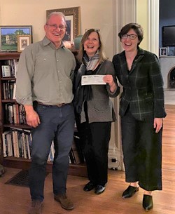 Richard Hunt presents AdventureKEEN's “Shop Local, Live Local” donation to Binc to representatives Kathy Bartson and Kate Weiss at an ABA Wi16 planning meeting in Cincinnati on March 9.