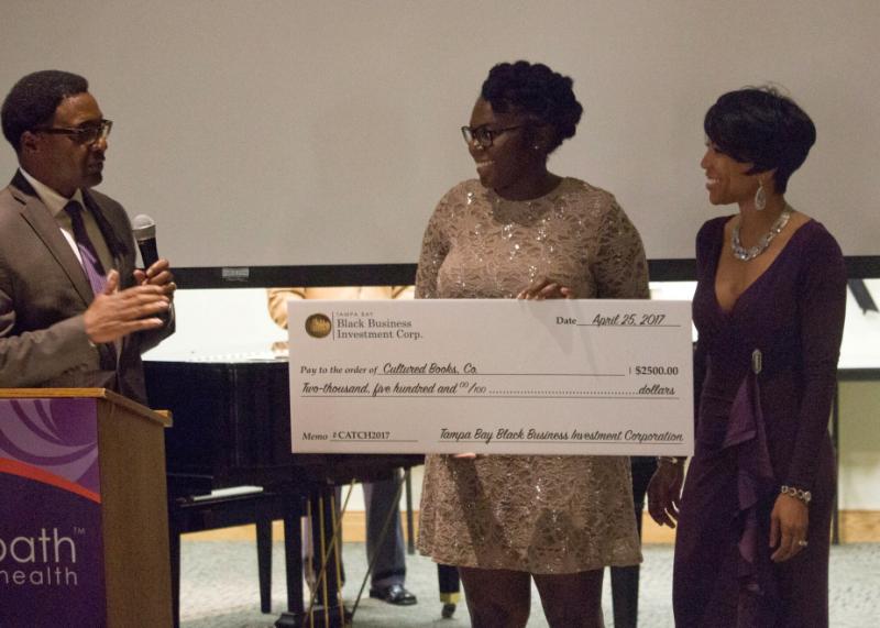 Lorielle J. Hollaway receives a grant. 