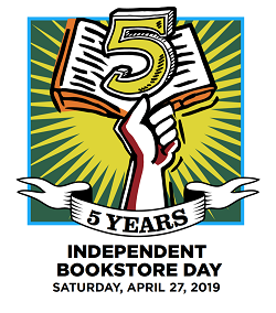 The Independent Bookstore Day Logo, which features a hand holding a book with the number 5 superimposed on it, in honor of the events fifth anniversary.