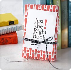 Photo of a book with a card that says "Just the right book"