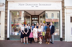 The staff at New Dominion Bookshop celebrating Independent Bookstore Day and their second annual Rose Garden Party. 