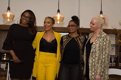 Noëlle Santos poses with fellow panelists Rosa Garcia, Raygrid Calderon, and Cara Alwill Leyba at the "Like She Owns the Place" event.