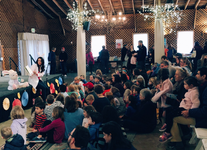 Camille Andros, author of "Charlotte the Scientist Is Squished" (Clarion Books), reads to children at the Whirlikids Book Festival.