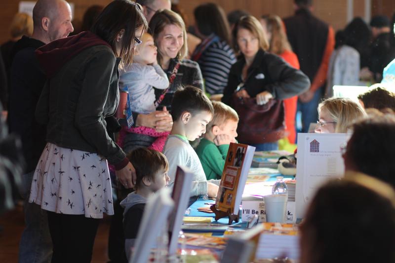 Children and families interact with authors at the 2016 WNY Children's Book Expo.