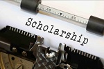 "scholarship" written on paper in typewriter