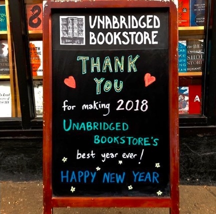Unabridged Books sign